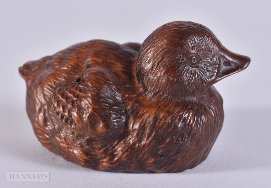 A CARVED WOOD DUCK. 3.2 x 5.7 x 3.5 cm. (1 of 4)