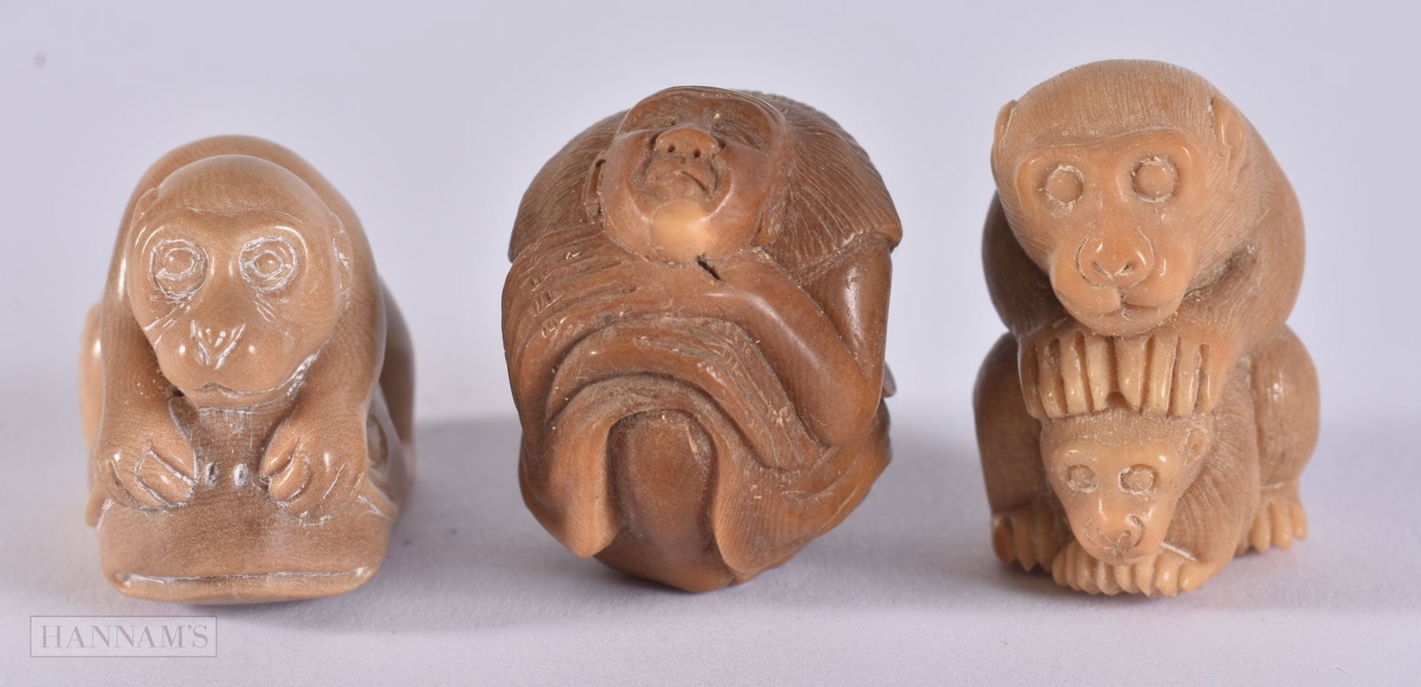 THREE NUT NETSUKES. 2.9 x 4.2 x 2.3 cm. (1 of 4)
