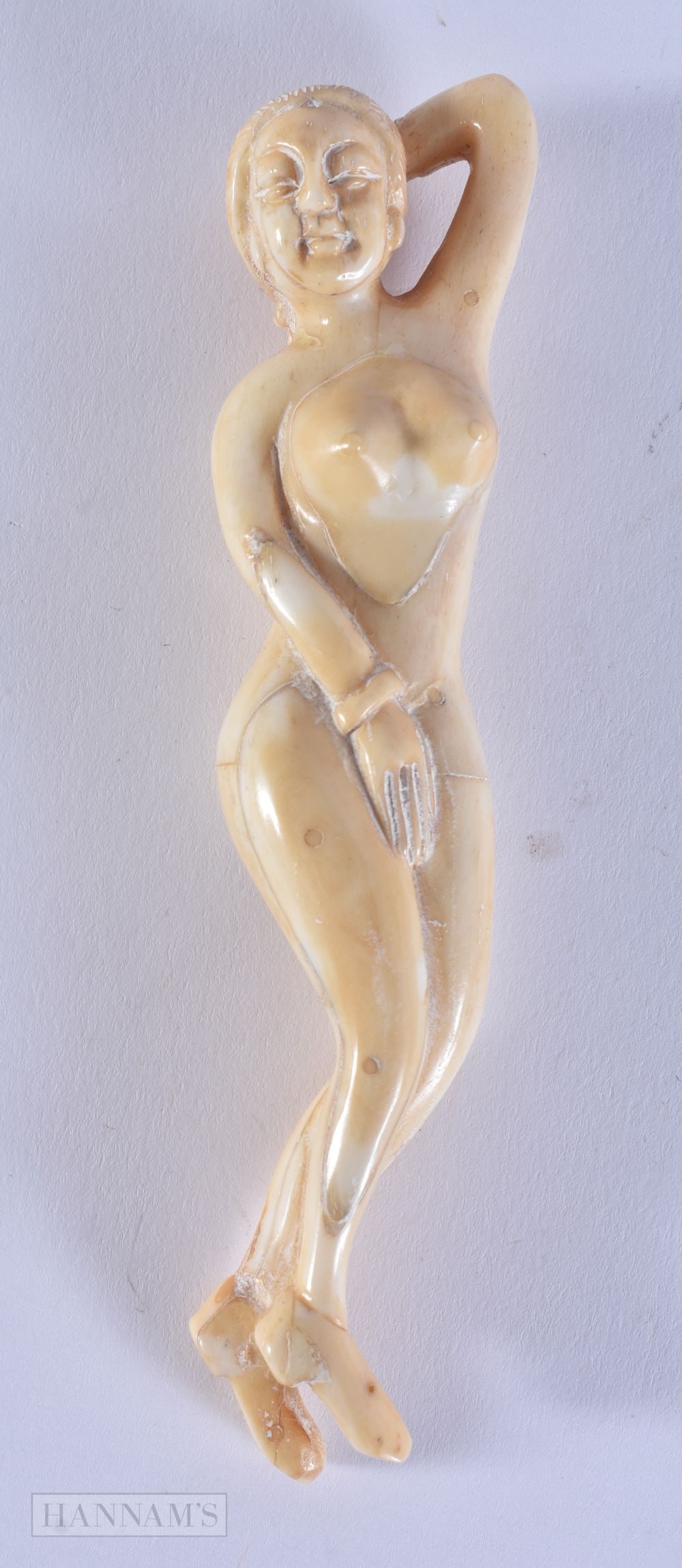 A BONE EROTIC FIGURE. 12.9 x 2.9 x 1.9 cm. (1 of 3)