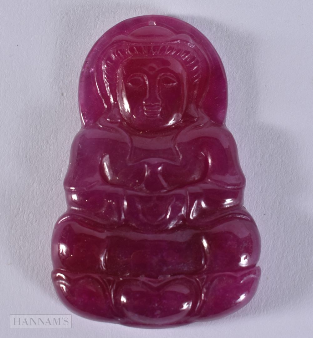 A TOURMALINE GOD PENDANT. 6.1 x 4 cm.: A TOURMALINE GOD PENDANT. 6.1 x 4 cm.