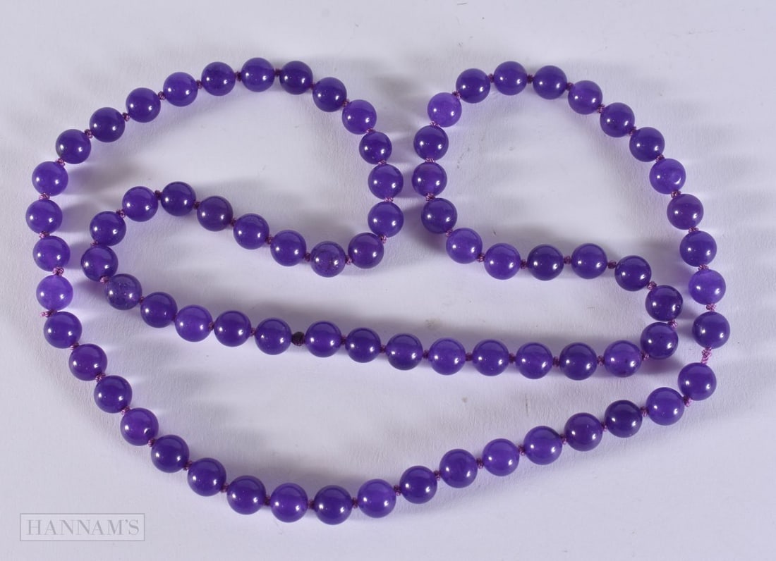 A STRING BEAD AMETHYST NECKLACE. 60 grams. 76 cm. (1 of 3)