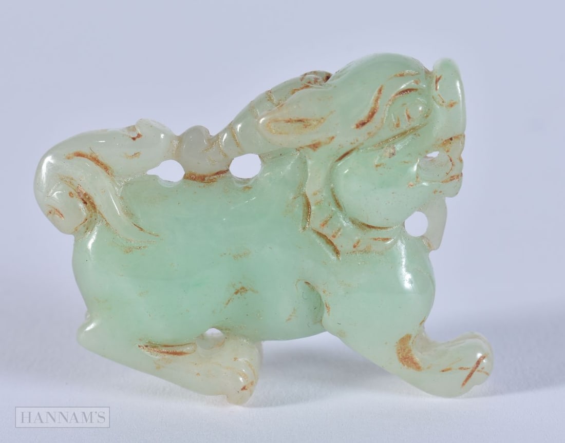 A JADE FOO DOG. 3.2 x 4.1 cm. (1 of 3)