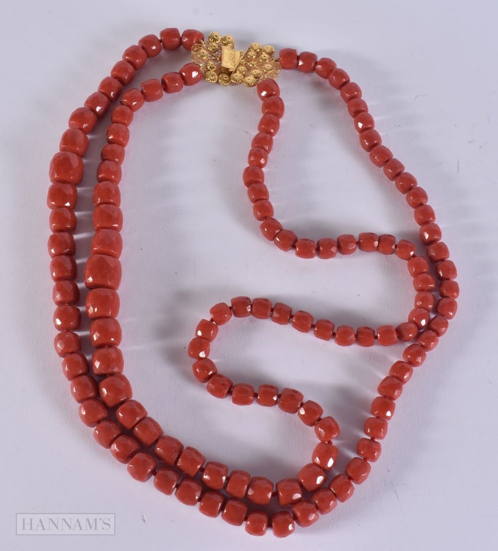 A 18CT CLASP STRING CORAL BEAD NECKLACE. 170 grams. 63 cm. (1 of 5)