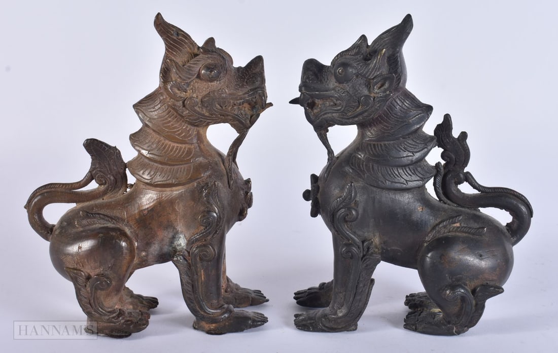 A PAIR OF 19TH CENTURY SOUTHEAST ASIAN BRONZE BEASTS. 18 cm x 12 cm. (1 of 5)