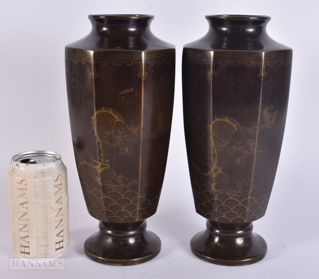 A PAIR OF 19TH CENTURY JAPANESE MEIJI PERIOD BRONZE DRAGON VASES. 26.5 cm high.: A PAIR OF 19TH CENTURY JAPANESE MEIJI PERIOD BRONZE DRAGON VASES. 26.5 cm high.