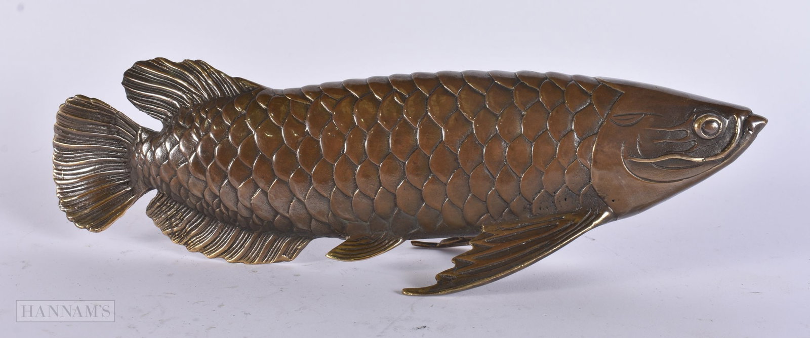 A CHINESE BRONZE FISH. 26cm wide.: A CHINESE BRONZE FISH. 26cm wide.