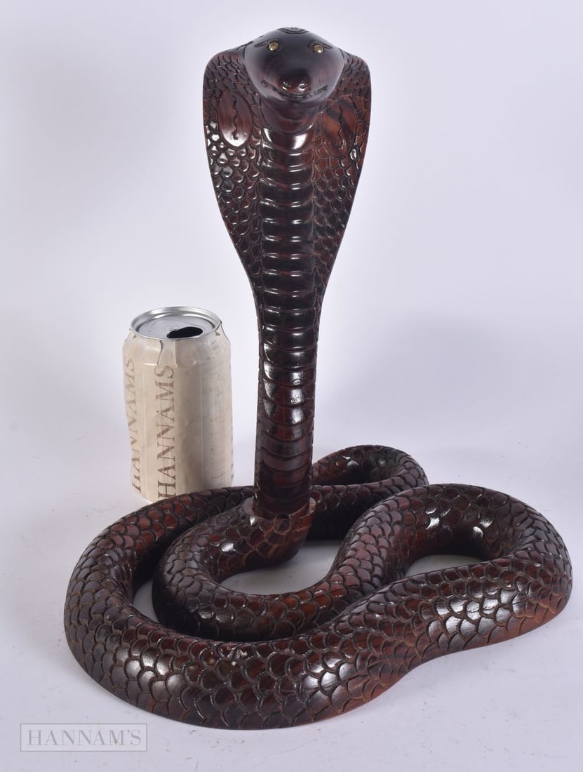 AN UNUSUAL INDIAN CARVED HARDWOOD COBRA. 32 cm x 24 cm. (1 of 4)