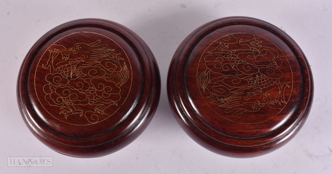 A PAIR OF CHINESE HARDWOOD CIRCULAR BOXES AND COVERS. 7 cm wide. (1 of 4)