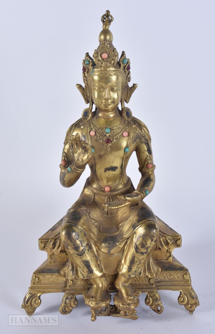A CHINESE TIBETAN JEWELLED BRONZE BUDDHA. 24.5 cm high.: A CHINESE TIBETAN JEWELLED BRONZE BUDDHA. 24.5 cm high.