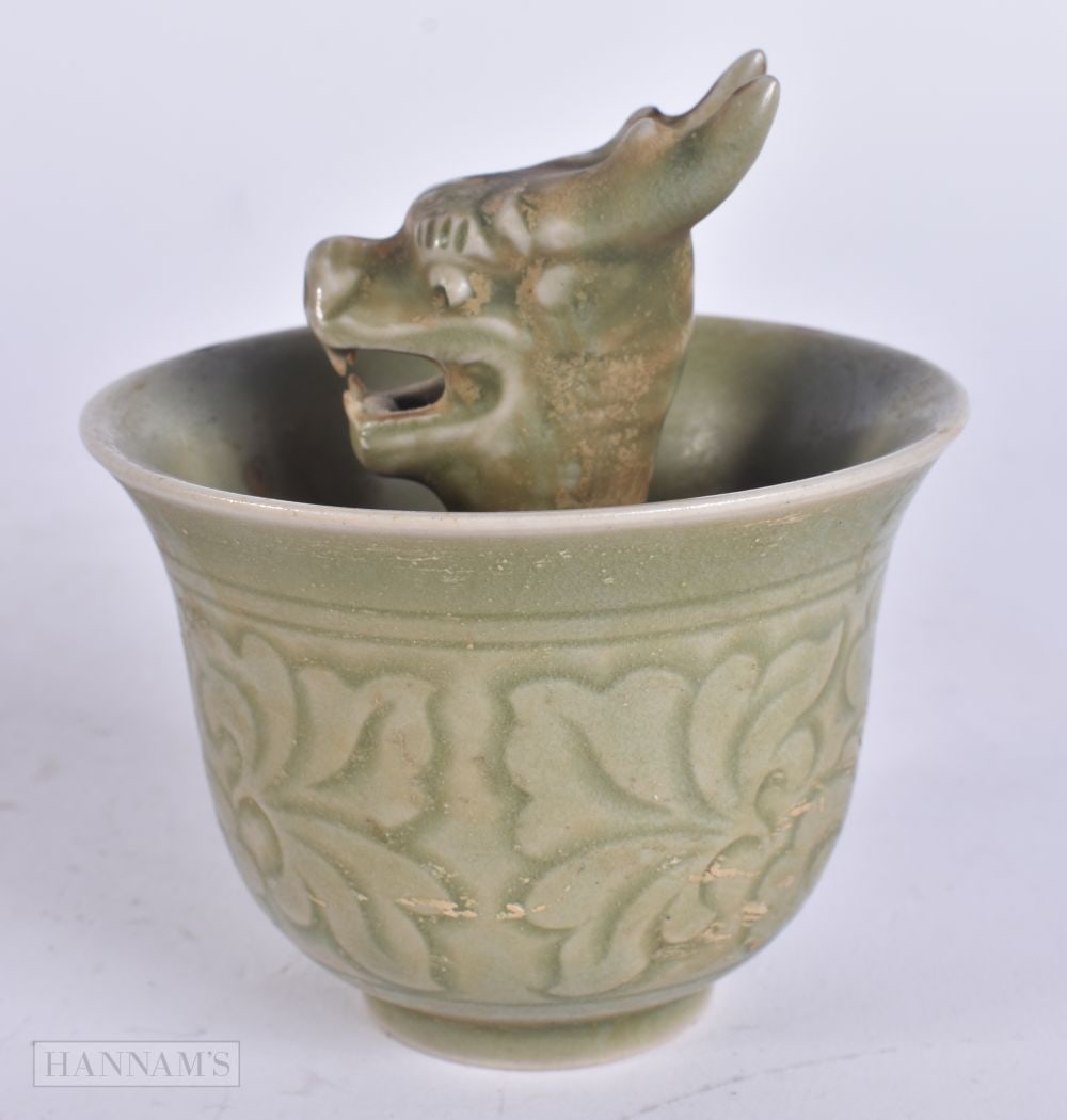 A CHINESE CELADON DRAGON SURPRISE TEABOWL. 8 cm wide. (1 of 4)