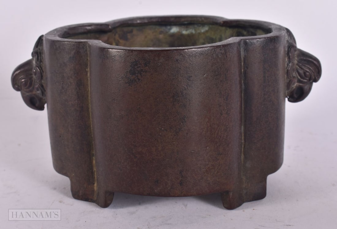 A CHINESE TWIN HANDLED BRONZE CENSER. 12 cm x 10 cm. (1 of 5)