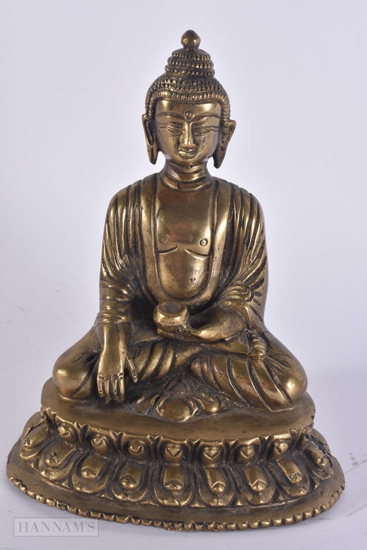 AN ANTIQUE INDIAN BRONZE BUDDHA. 16.5 cm high.: AN ANTIQUE INDIAN BRONZE BUDDHA. 16.5 cm high.