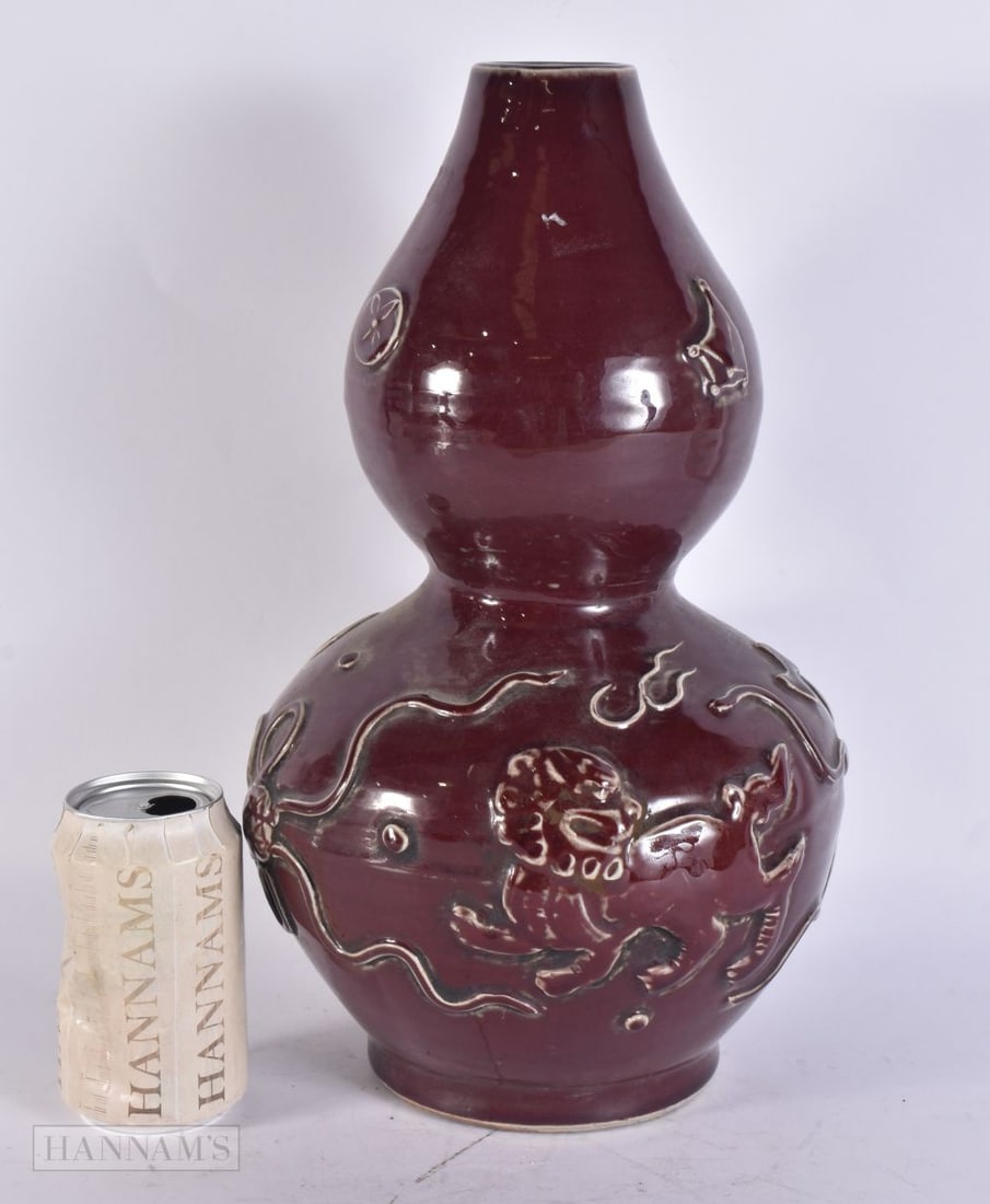 A CHINESE RED GLAZED GOURD VASE. 37 cm high. (1 of 4)