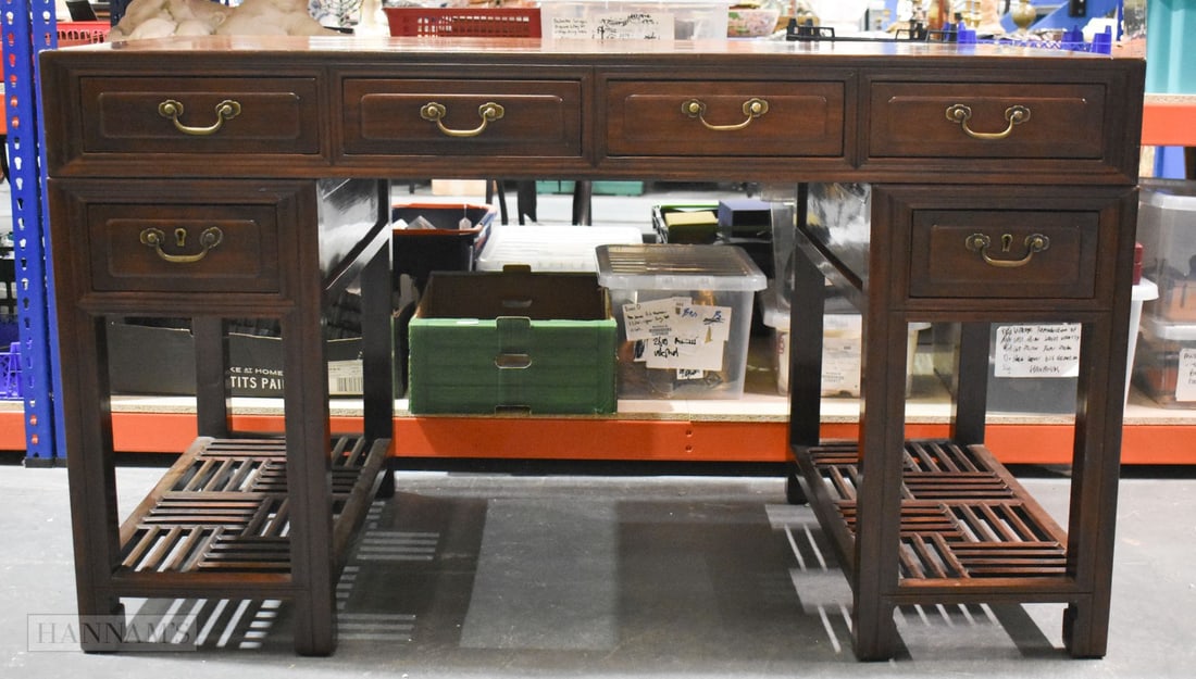 A 19TH CENTURY CHINESE CARVED HUANGHUALI WOOD DESK Late Qing. 143 cm x 70 cm x 74 cm.: A 19TH CENTURY CHINESE CARVED HUANGHUALI WOOD DESK Late Qing. 143 cm x 70 cm x 74 cm.