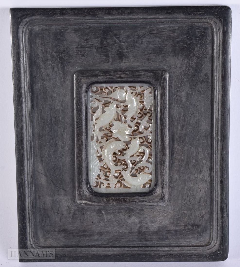 AN EARLY 20TH CENTURY CHINESE HARDWOOD AND JADE RETICULATED PANEL Late Qing/Republic. 18 cm x 15 cm,: AN EARLY 20TH CENTURY CHINESE HARDWOOD AND JADE RETICULATED PANEL Late Qing/Republic. 18 cm x 15 cm, jade 8 cm x 5.5 cm.
