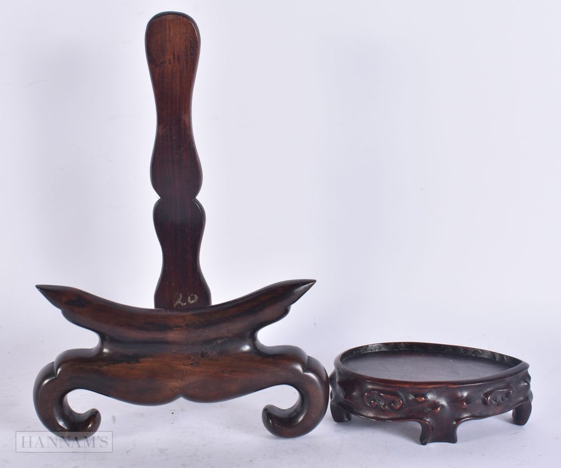 A LATE 19TH CENTURY CHINESE CARVED HARDWOOD STAND Late Qing, together with another. Largest 25cm x 1: A LATE 19TH CENTURY CHINESE CARVED HARDWOOD STAND Late Qing, together with another. Largest 25cm x 12 cm. (2)