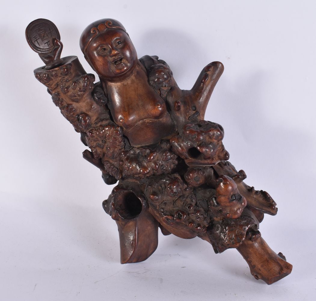 A 19TH CENTURY CHINESE CARVED ROOTWOOD FIGURE OF AN IMMORTAL Qing. 29 cm long.: A 19TH CENTURY CHINESE CARVED ROOTWOOD FIGURE OF AN IMMORTAL Qing. 29 cm long.