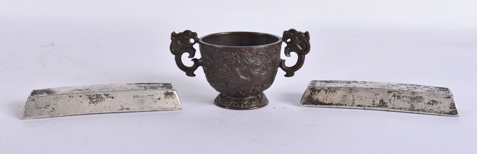 A CHINESE TWIN HANDLED BRONZE CENSER together with a pair of scroll weights. Largest 12 cm wide. (3) (1 of 8)