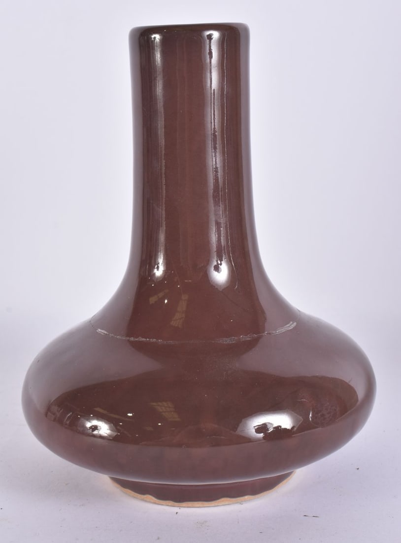A CHINESE BROWN GLAZED PORCELAIN VASE. 19 cm high. (1 of 4)