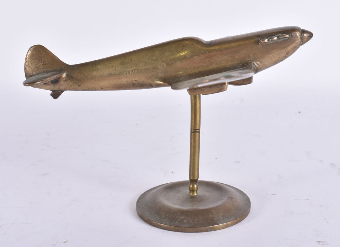 A MILITARY INTEREST 1950S BRONZE PLANE DESK SCULPTURE. 15 cm x 15 cm. (1 of 4)