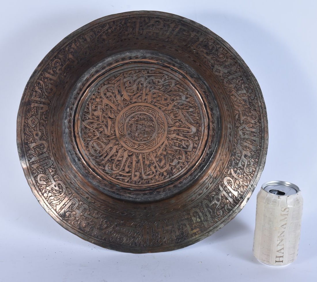 A 19TH CENTURY MIDDLE EASTERN COPPER ALLOY ISLAMIC KUFIC BASIN. 28cm wide. (1 of 8)