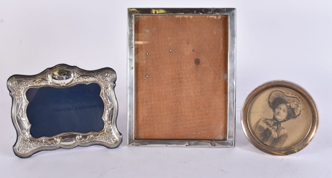 THREE SILVER PHOTOGRAPH FRAMES. Largest 24 cm x 18 cm. (3) (1 of 7)