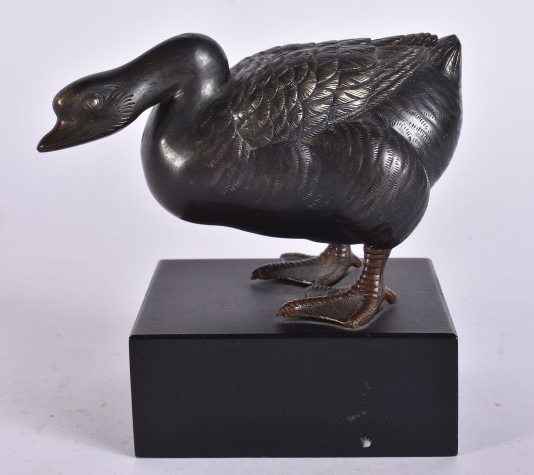 A 19TH CENTURY JAPANESE MEIJI PERIOD SHAKUDO FIGURE OF A DUCK. 9.5 cm x 7.5 cm.: A 19TH CENTURY JAPANESE MEIJI PERIOD SHAKUDO FIGURE OF A DUCK. 9.5 cm x 7.5 cm.