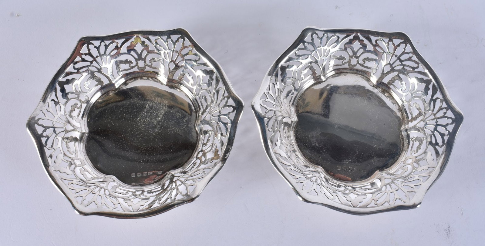 A PAIR OF EDWARDIAN SILVER BON BON DISHES. Birmingham 1913. 66.4 grams. 10.25cm wide. (1 of 4)