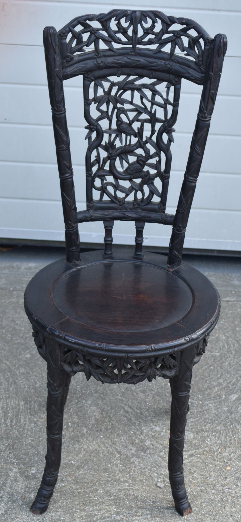 A 19TH CENTURY CHINESE CARVED HARDWOOD CHAIR Late Qing. 94 cm high.: A 19TH CENTURY CHINESE CARVED HARDWOOD CHAIR Late Qing. 94 cm high.