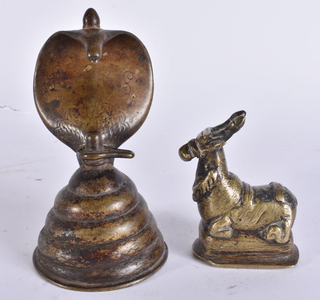 AN 18TH CENTURY INDIAN HINDU BRONZE COBRA together with a smaller bronze cow. Largest 14.5 cm high. (1 of 4)