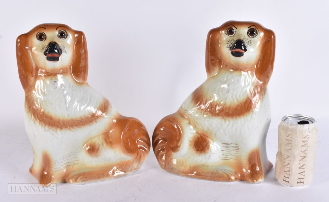 A PAIR OF STAFFORDSHIRE POTTERY DOGS. 30 cm x 22 cm. (1 of 4)