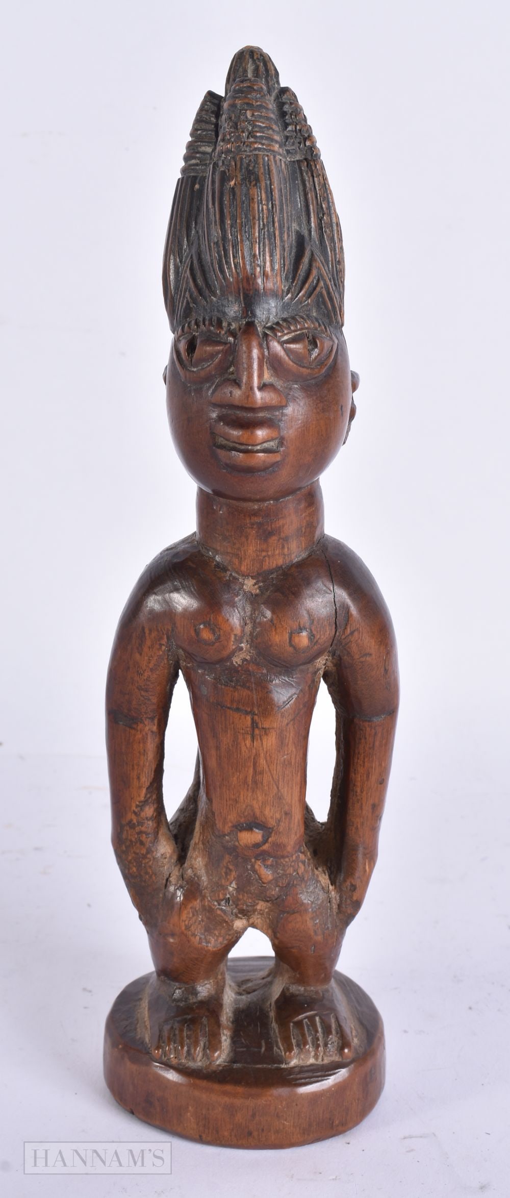 AN AFRICAN TRIBAL CARVED WOOD FERTILITY FIGURE. 24 cm high. (1 of 7)