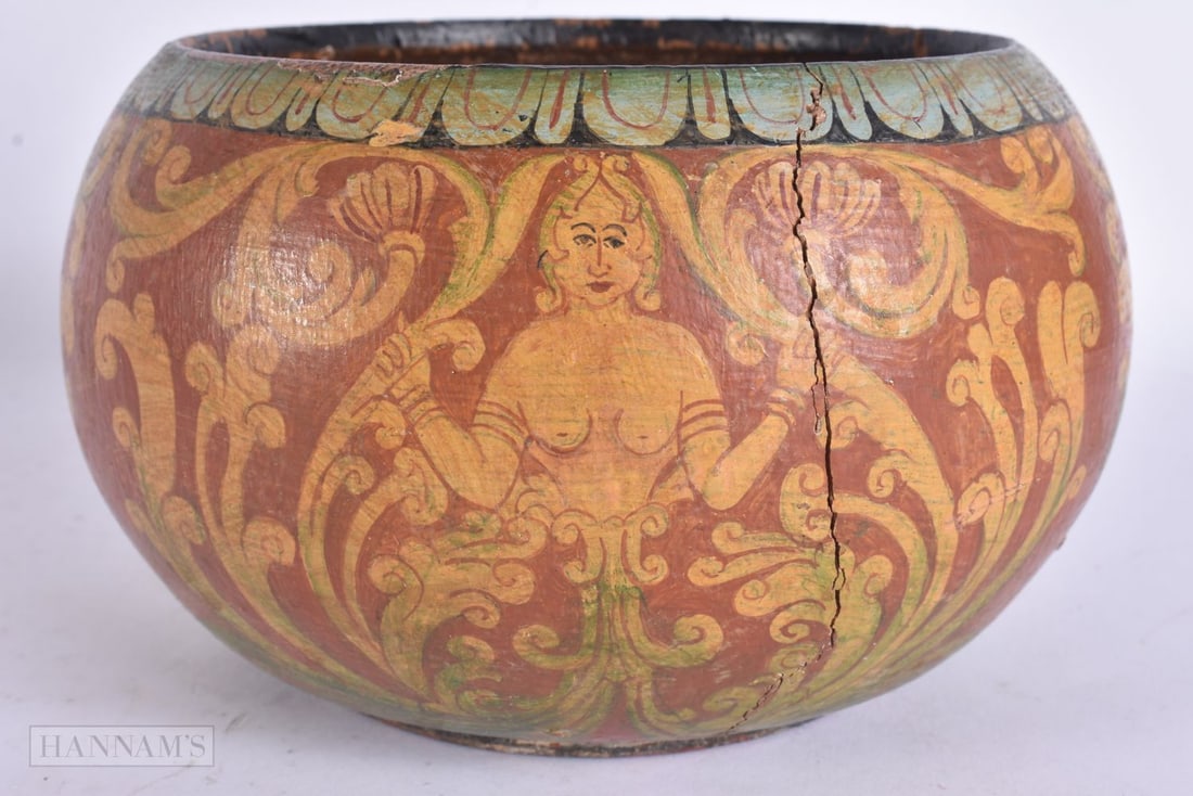 A LATE 19TH CENTURY INDIAN PAINTED WOOD BOWL depicting figures amongst foliage. 16 cm x 10 cm. (1 of 5)