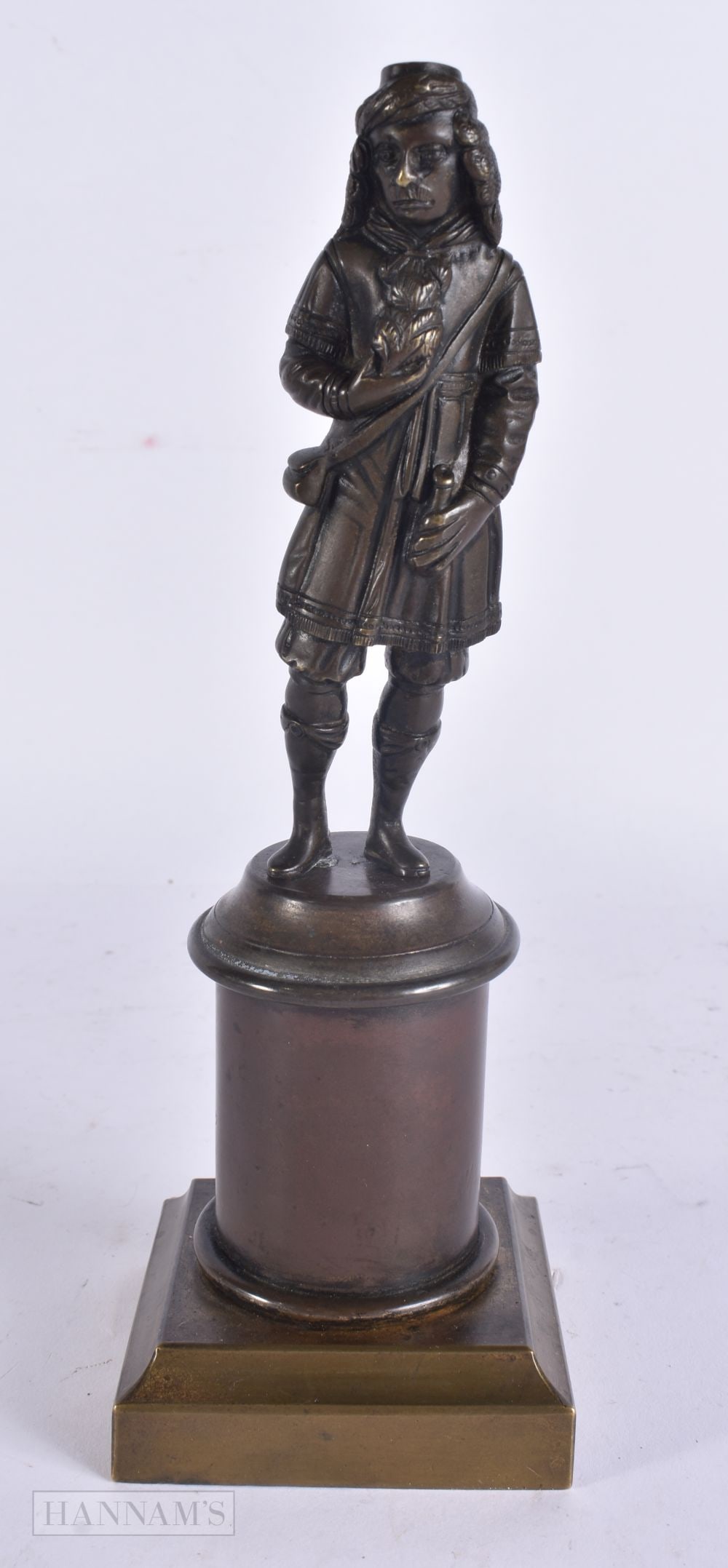 AN 18TH CENTURY BRONZE FIGURE OF A MALE modelled upon a pedestal. 23.5 cm high. (1 of 7)