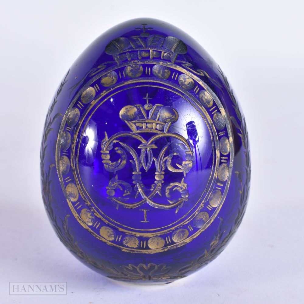 A RUSSIAN BLUE GLASS MARITIME EASTER EGG. 7.5 cm x 5.5 cm. (1 of 5)