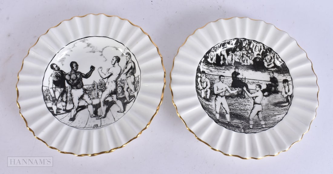 A RARE PAIR OF CROWN STAFFORDSHIRE 'BARE KNUCKLE BOXING' SCALLOPED PLATES made by order of the Marqu: A RARE PAIR OF CROWN STAFFORDSHIRE 'BARE KNUCKLE BOXING' SCALLOPED PLATES made by order of the Marquis of Queensbury. 21.5 cm wide.