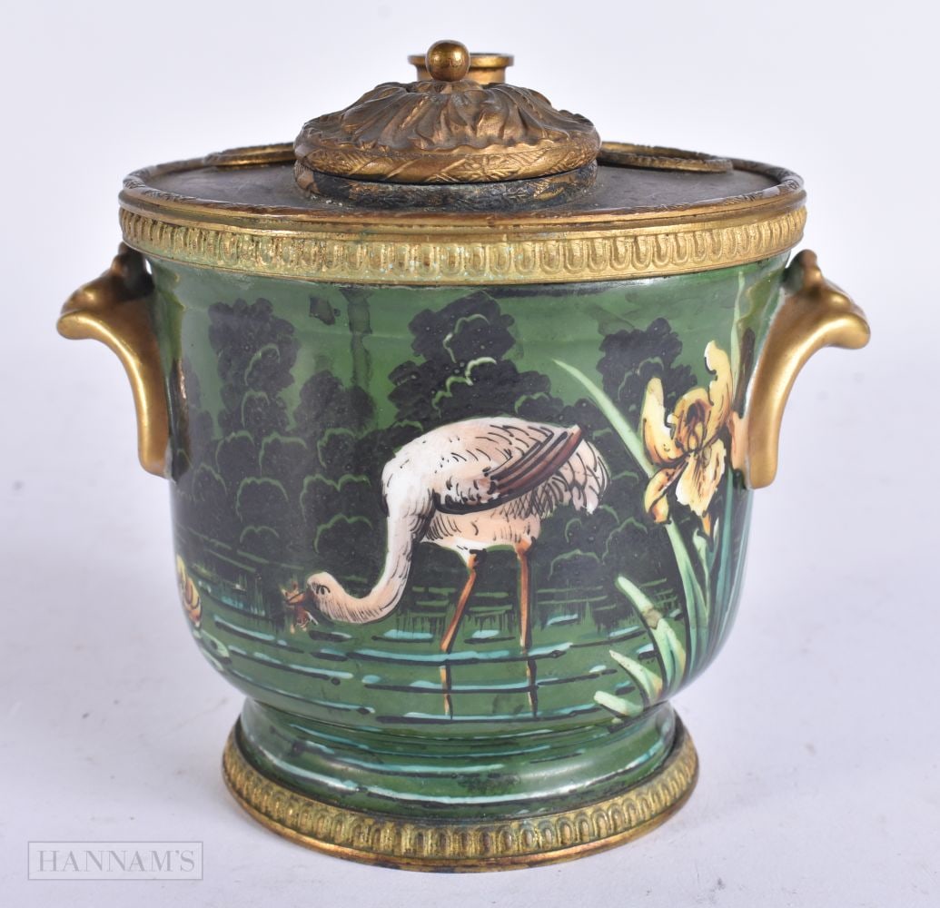 A LATE 19TH CENTURY FRENCH PORCELAIN INKWELL painted with a Flamengo in a watering Hole. 10 cm x 9.5: A LATE 19TH CENTURY FRENCH PORCELAIN INKWELL painted with a Flamengo in a watering Hole. 10 cm x 9.5 cm.