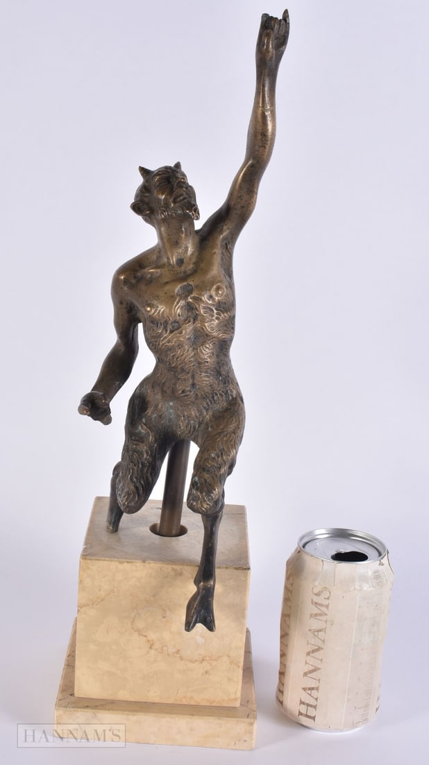 AN UNUSUAL LARGE 19TH CENTURY GRAND TOUR BRONZE FIGURE OF A FAWN modelled upon a marble plinth. 41.5: AN UNUSUAL LARGE 19TH CENTURY GRAND TOUR BRONZE FIGURE OF A FAWN modelled upon a marble plinth. 41.5 cm high.