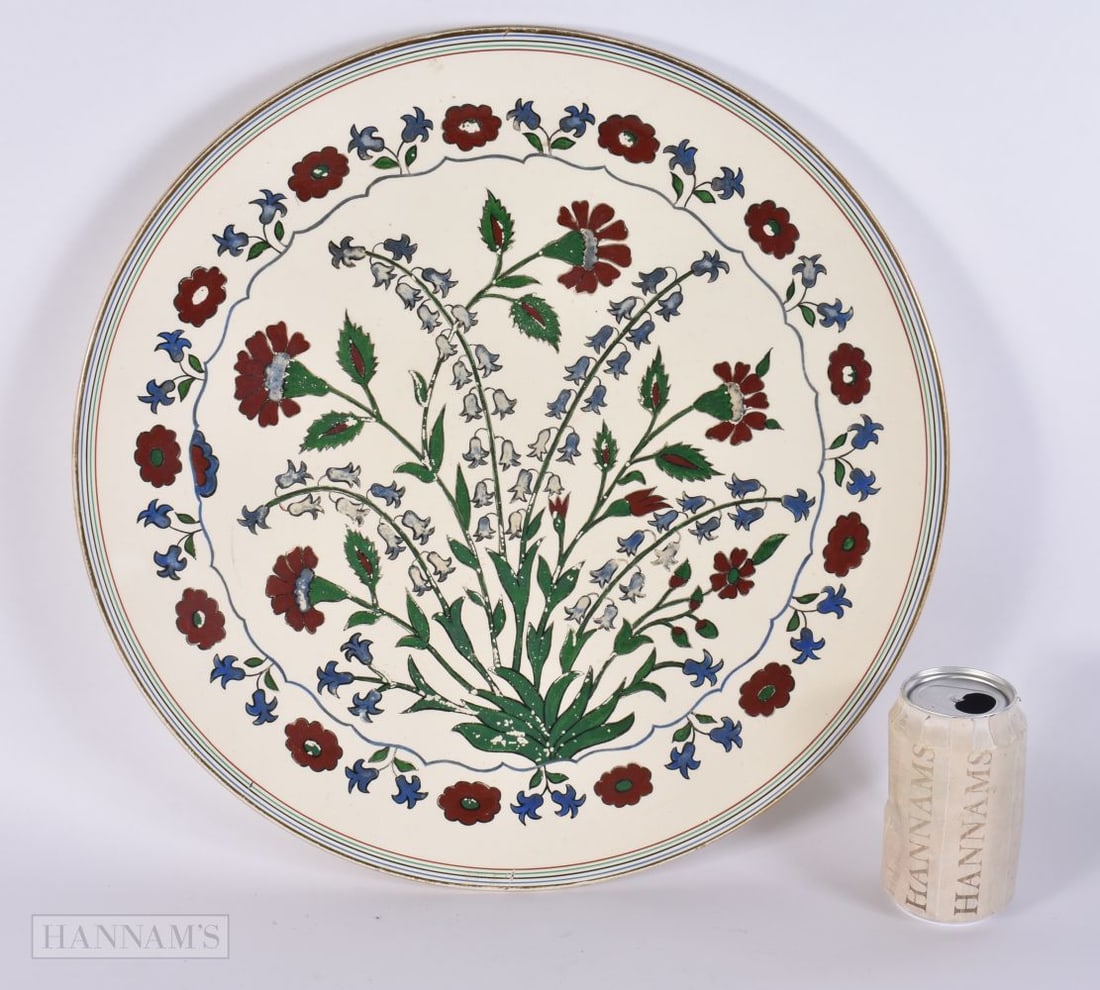 AN ANTIQUE FRENCH MUSEE DE CLUNY IZNIK DISH enamelled with flowers. 42 cm wide. (1 of 5)