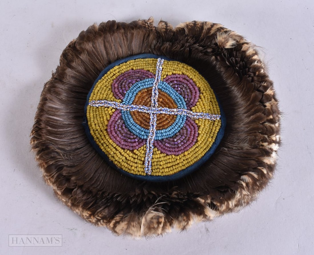 A NORTH AMERICAN BEAD WORK TRIBAL EAR. 11.5 cm wide.: A NORTH AMERICAN BEAD WORK TRIBAL EAR. 11.5 cm wide.