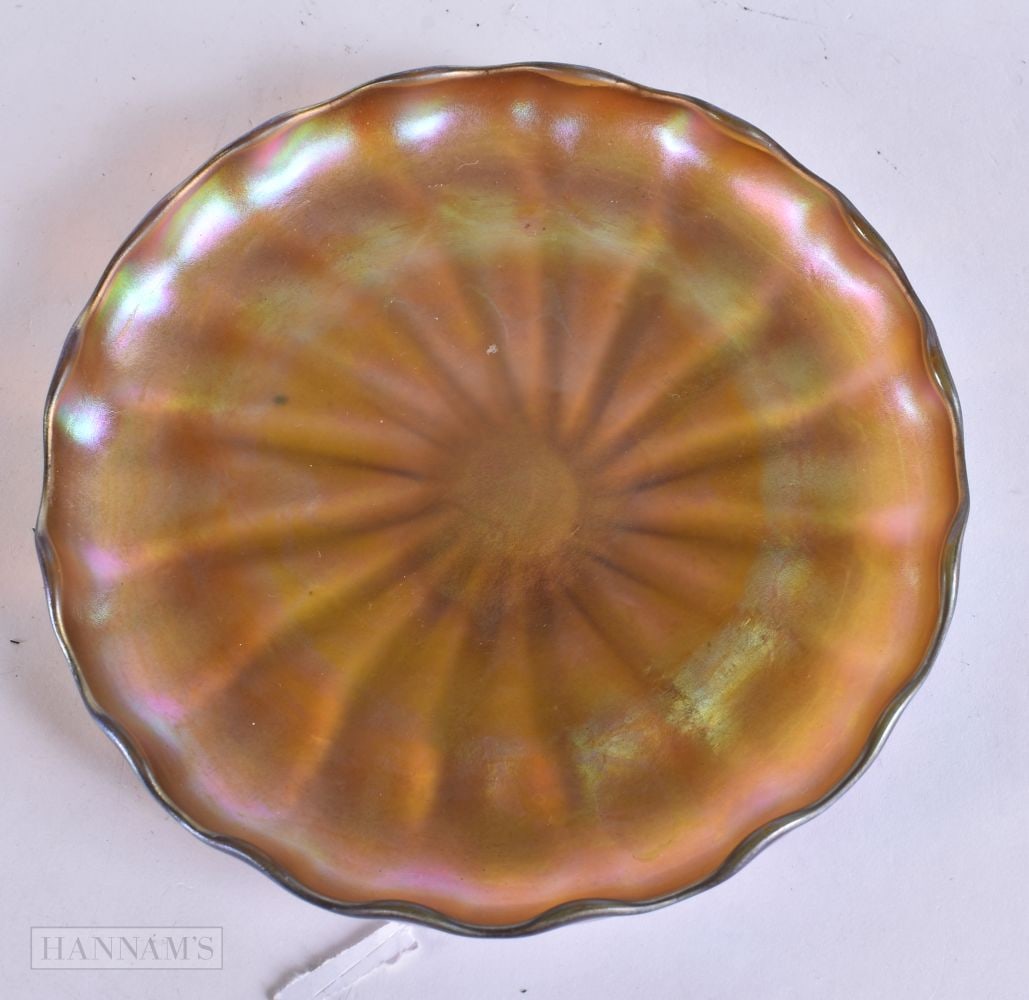 A TIFFANY STYLE IRIDESCENT GLASS DISH by Nash. 12.5 cm wide.: A TIFFANY STYLE IRIDESCENT GLASS DISH by Nash. 12.5 cm wide.