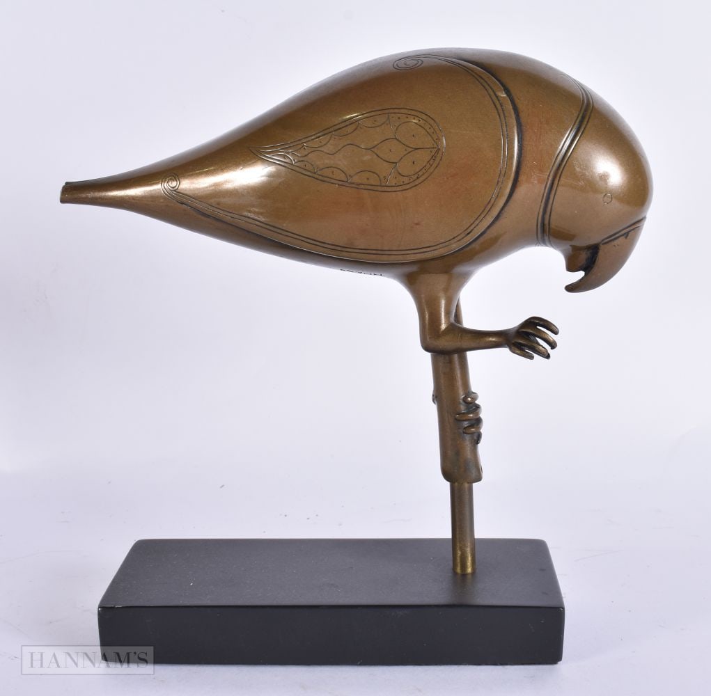 A PERSIAN INFLUENCED BRONZED BIRD ON STAND. 21 cm x 15 cm.: A PERSIAN INFLUENCED BRONZED BIRD ON STAND. 21 cm x 15 cm.