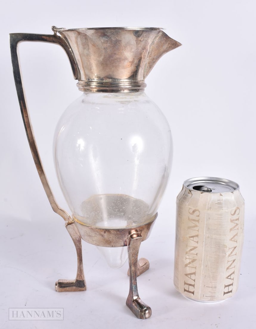 A SILVER PLATED DRESSER DESIGN CLARET JUG. 28 cm high. (1 of 6)