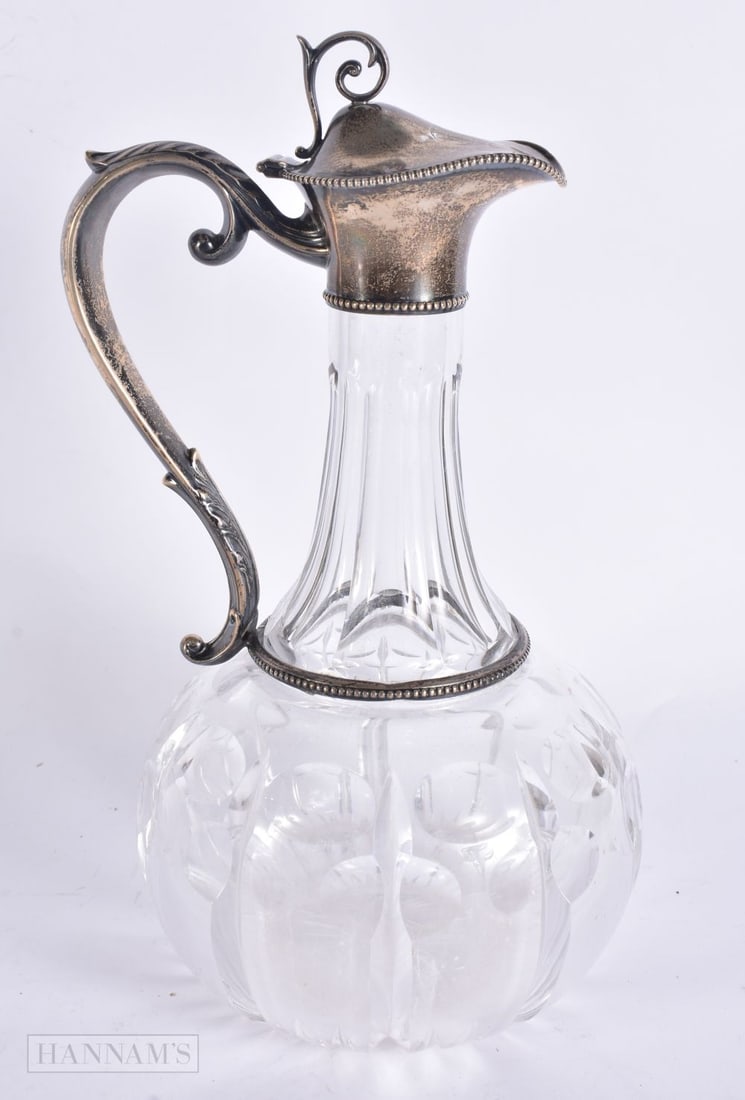 AN ANTIQUE SILVER MOUNTED CLARET JUG. 24 cm high. (1 of 6)