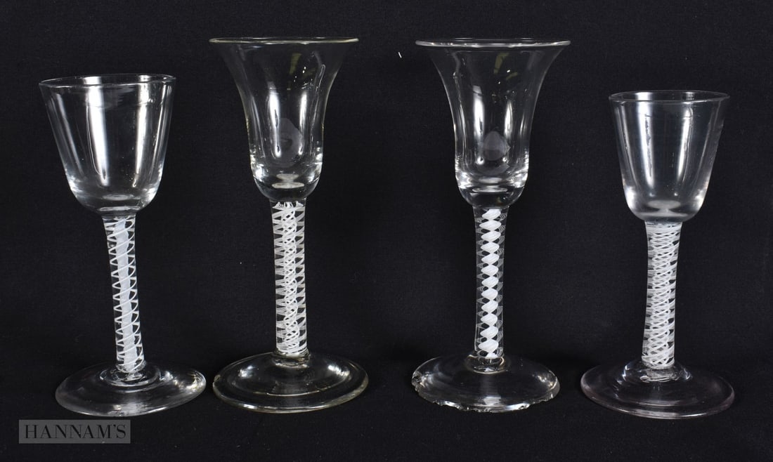 FOUR ANTIQUE SPIRAL TWIST GLASSES. Largest 17.5 cm high. (4) (1 of 5)