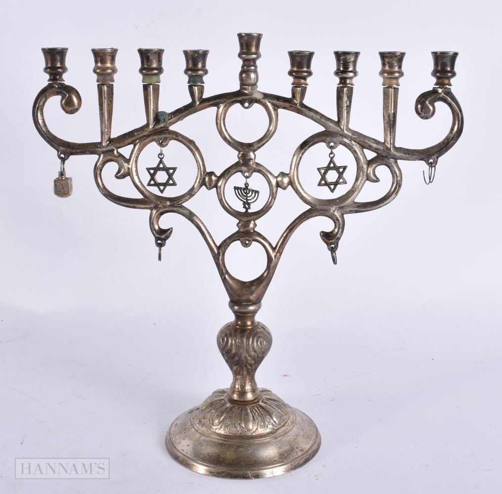 A VINTAGE WHITE METAL MENORAH. 694 grams overall. 26 cm x 18 cm. (1 of 6)
