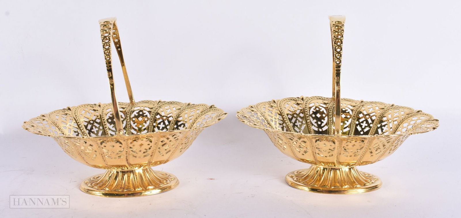 A PAIR OF ANTIQUE SILVER GILT BASKETS. 282 grams. 15 cm x 12 cm. (1 of 6)