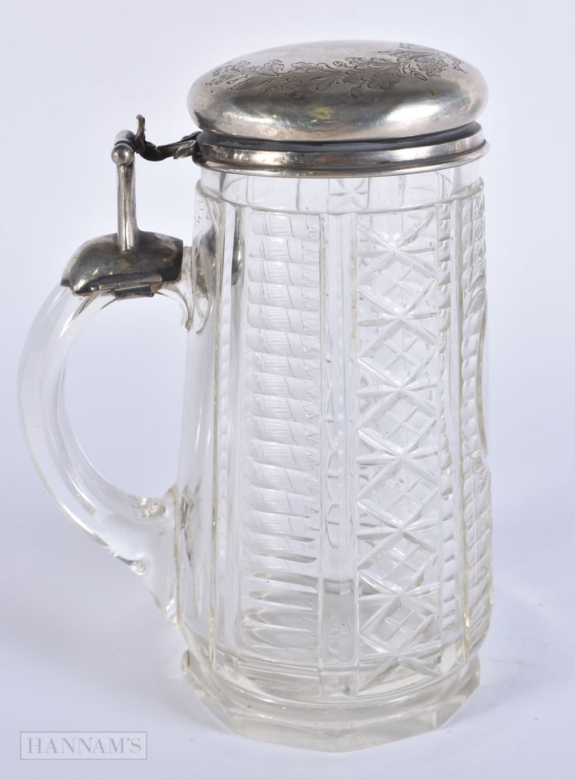 A CONTINENTAL SILVER MOUNTED GLASS STEIN. 18 cm high. (1 of 3)