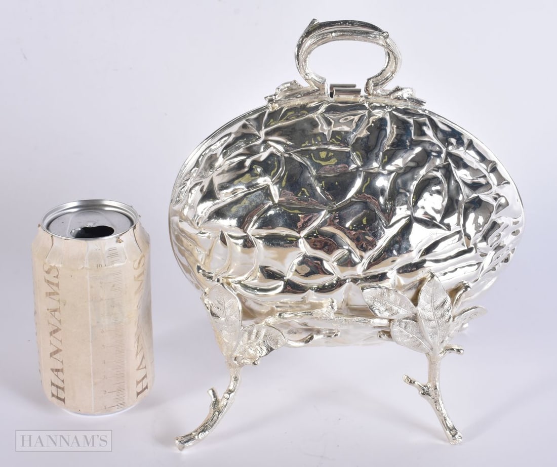 A SILVER PLATED WALNUT BISCUIT BARREL. 23 cm x 14 cm. (1 of 4)