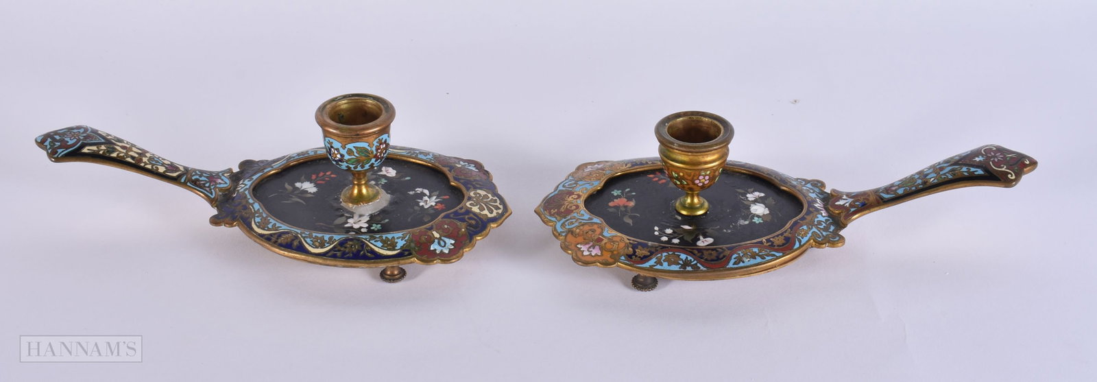 A PAIR OF 19TH CENTURY FRENCH PIETRA DURA CHAMPLEVE ENAMEL BRONZE CHAMBERSTICKS. 20 cm wide. (1 of 4)